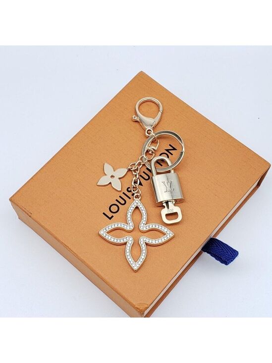 Louis Vuitton Accessories - Authentic Louis Vuitton Gold Lock & Box w/ Unbranded Clover Bagcharm